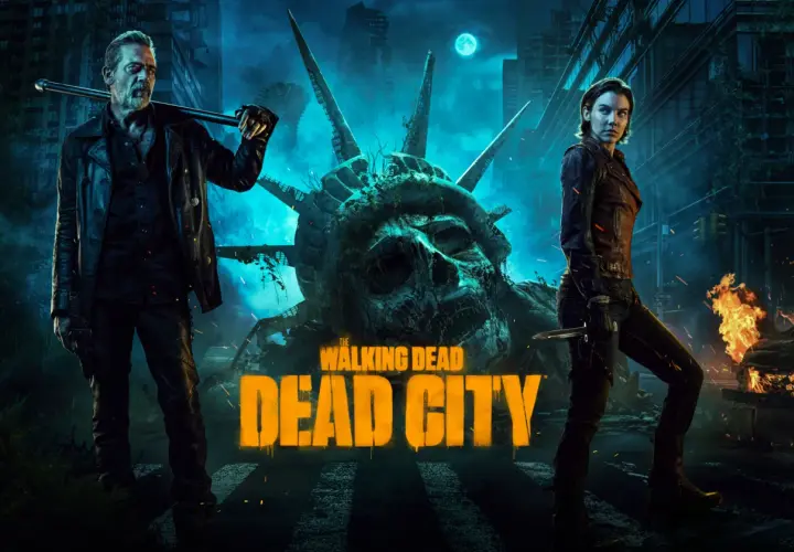 Dwóch bohaterów, Negan i Maggie, stoi na tle zniszczonej Statuy Wolności w mrocznym, postapokaliptycznym mieście. Tytuł "The Walking Dead: Dead City" widnieje na pierwszym planie.